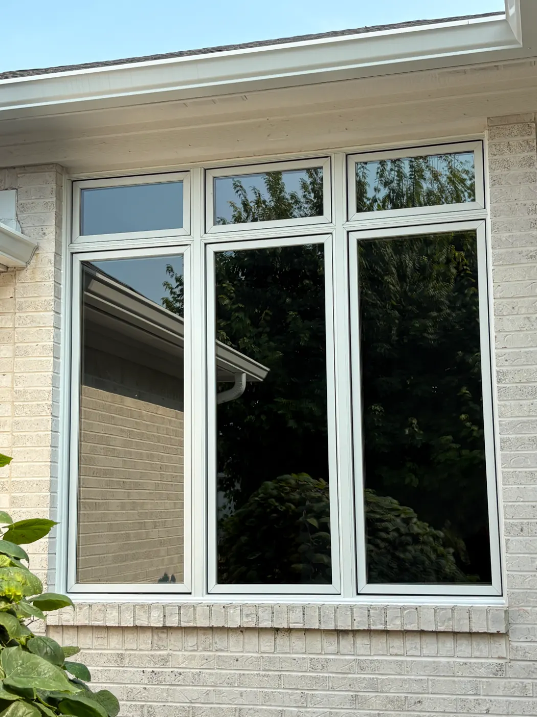 Storm-damaged window documented in Holliday Farms